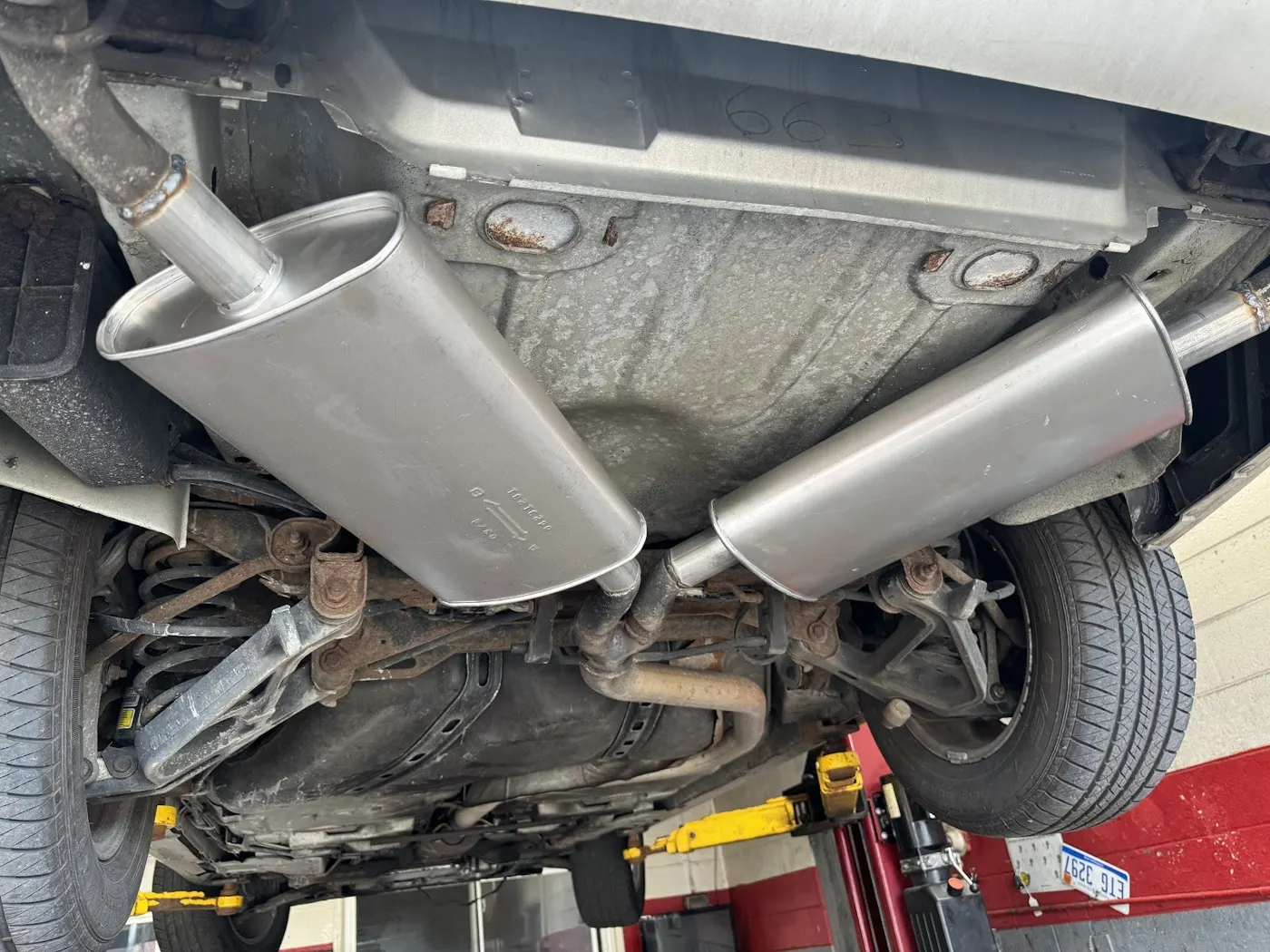 Exhaust work on a vehicle on the lift