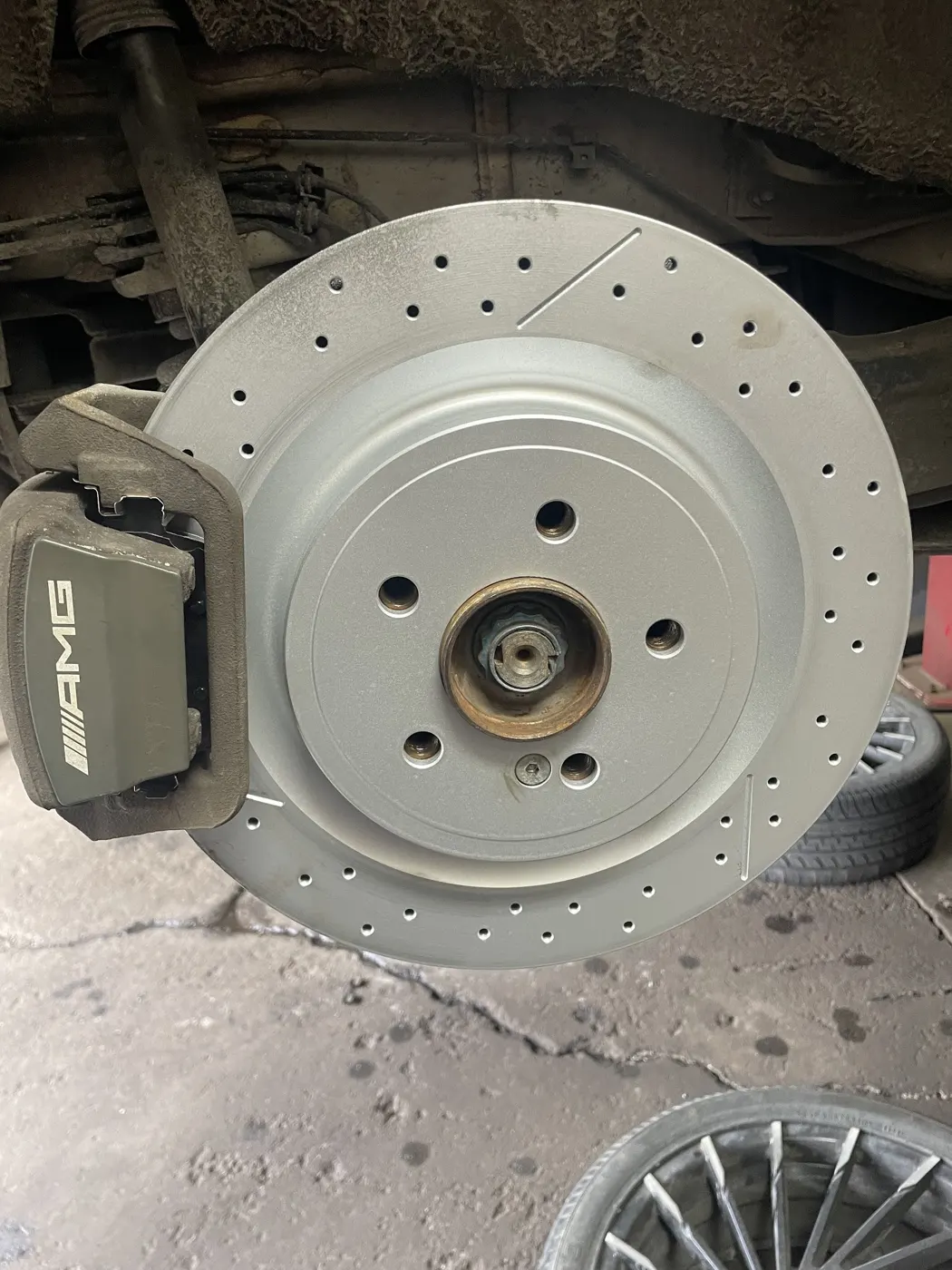 A brake rotor being worked on